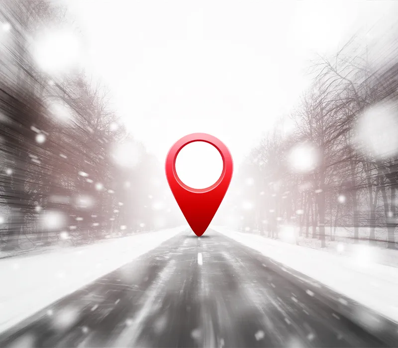 GPS Symbol auf zugeschneiter Straße